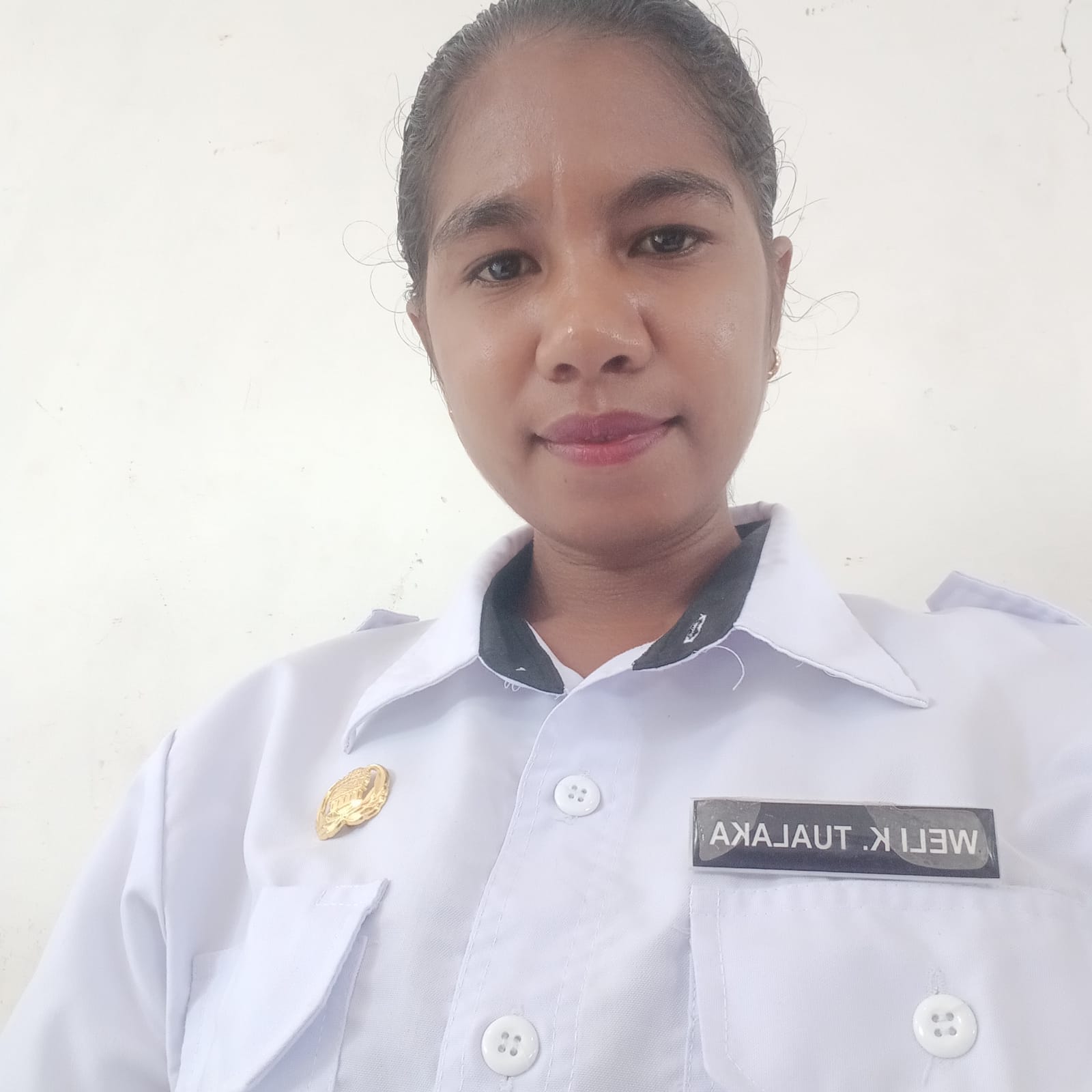Weli K Tualaka, S.Pd